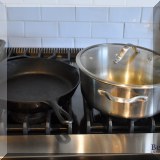 K02. Cast iron and Calphalon pans. 